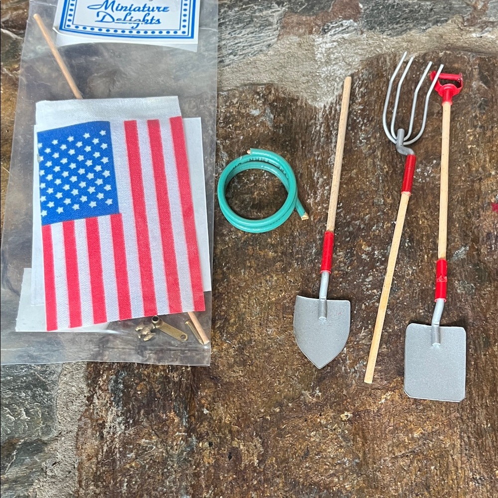 Dollhouse accessories. Garden hose, rake, 2 shovels, and a flag pole.